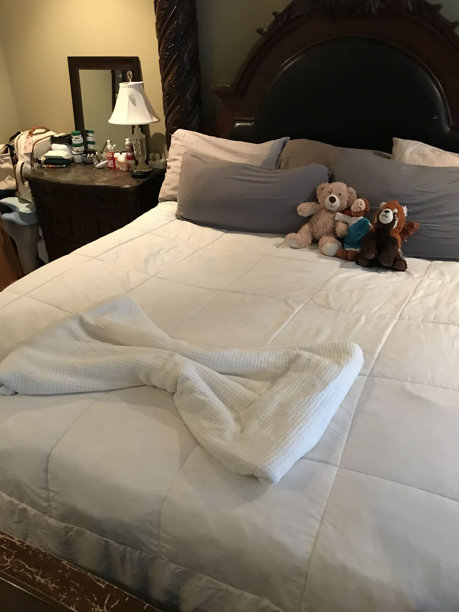 Master bedroom after cleaning — made bed, tidy
